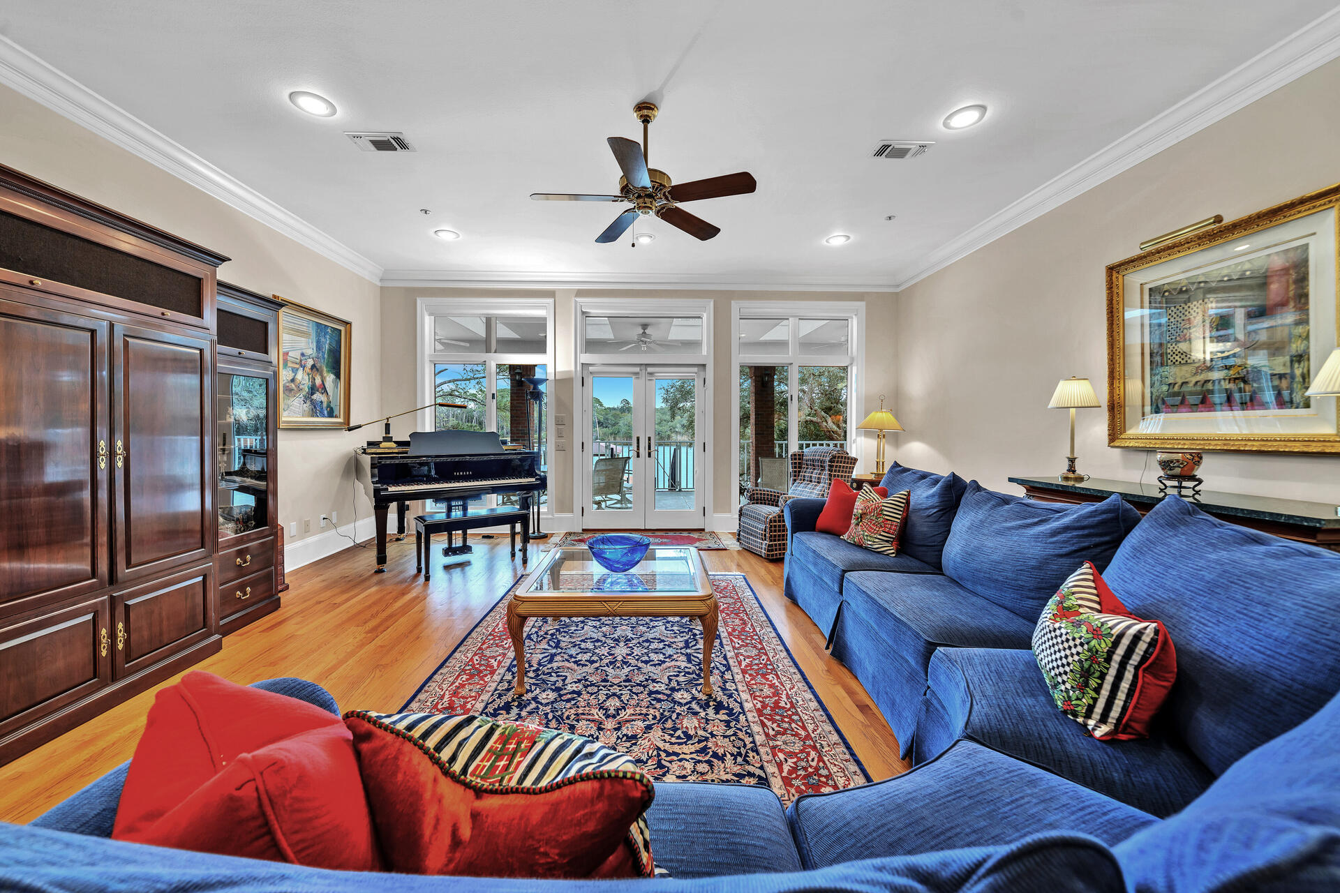 35 Poquito Road Shalimar, FL 32579 - Photo 21 of 87 a living room with furniture a ceiling fan and a rug