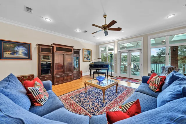 a view of livingroom with furniture and workspace