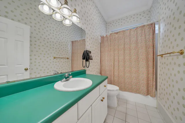 a view of a lake with a house in the background