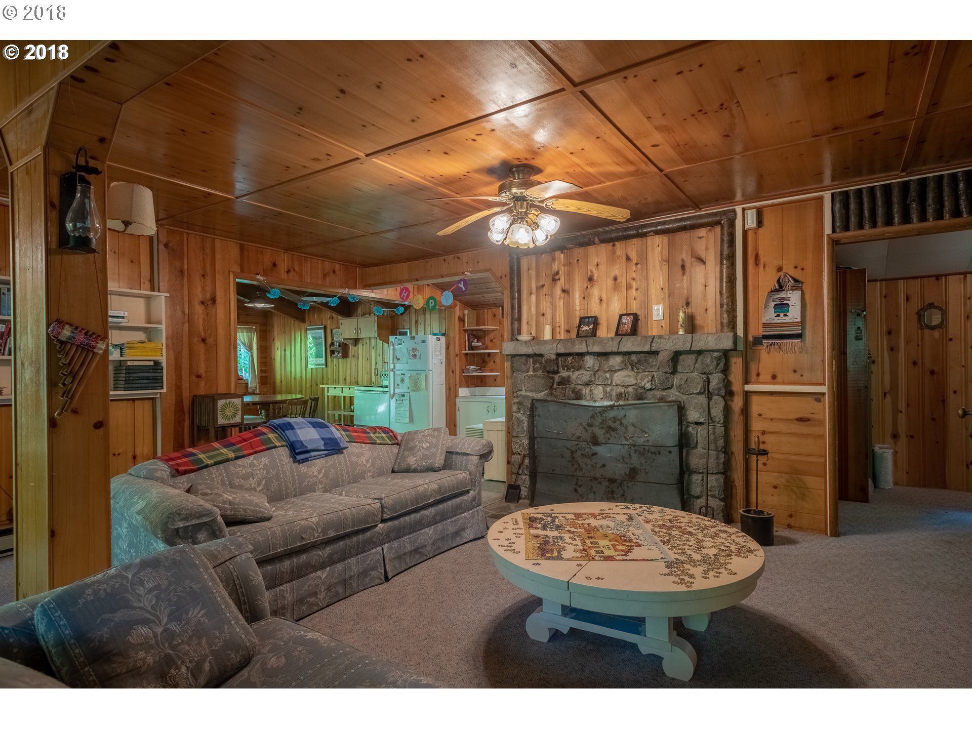 74856 Road 26, Unit 44 Rhododendron, OR 97049 - Photo 6 of 28 a living room with a couch and a table