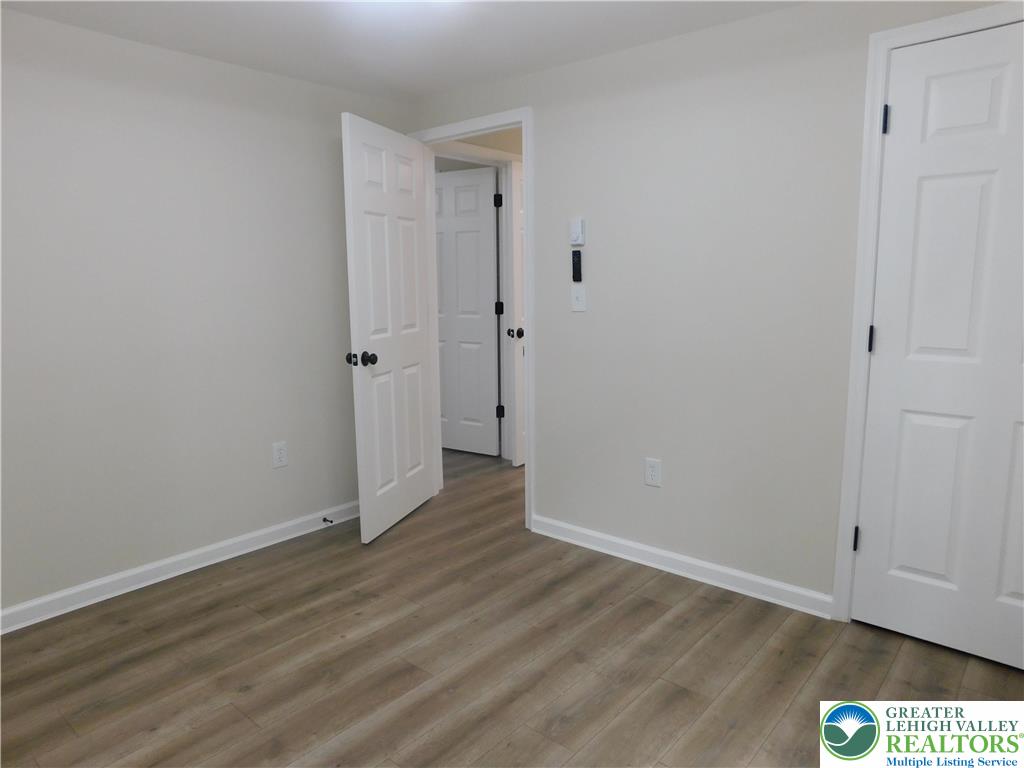 1405 Donalds Road Effort, PA 18330 - Photo 31 of 31 a view of an empty room with wooden floor