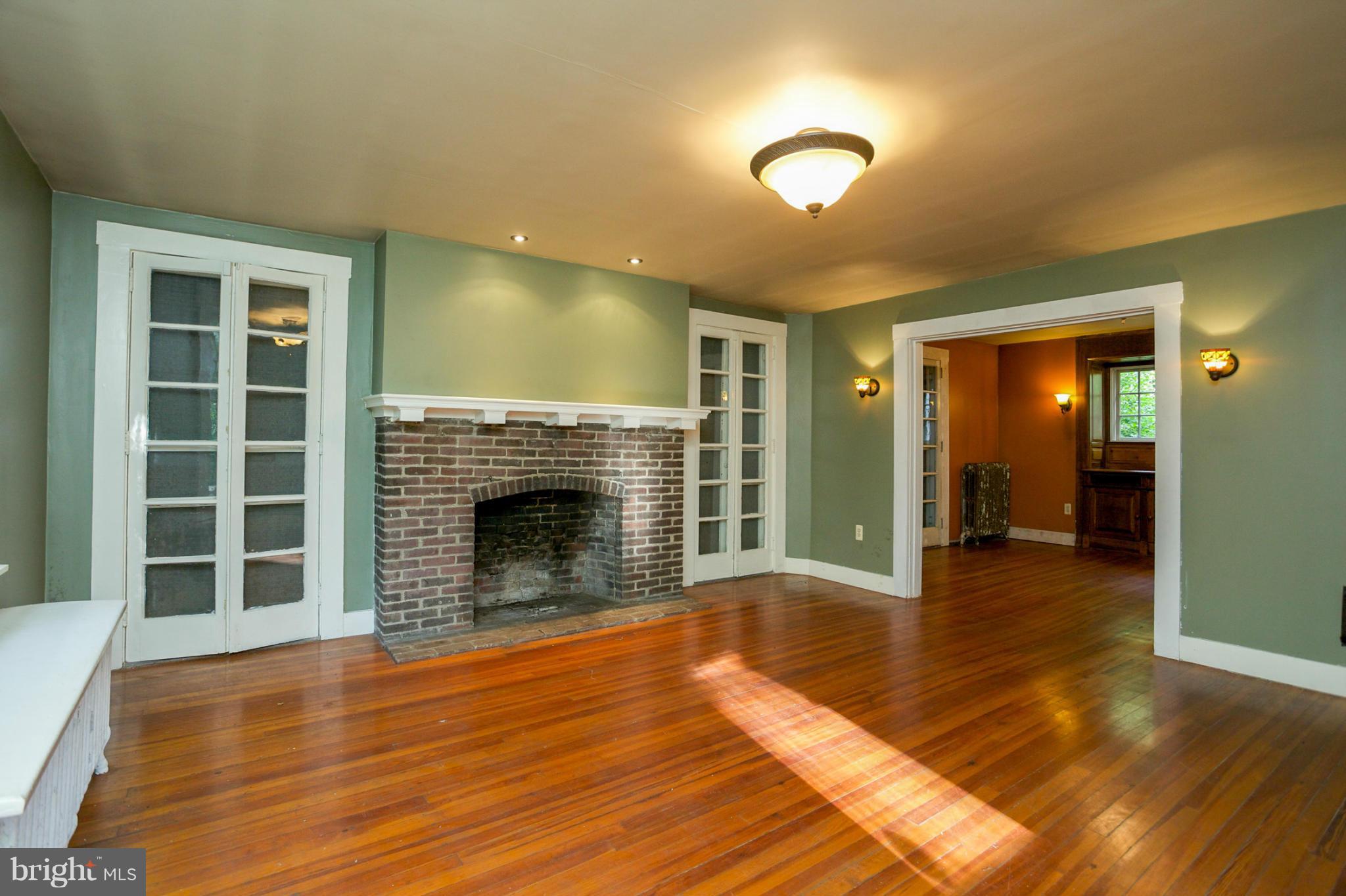 1730 Carrs Mill Road Fallston, MD 21047 - Photo 12 of 29 a view of a livingroom with wooden floor and a fireplace