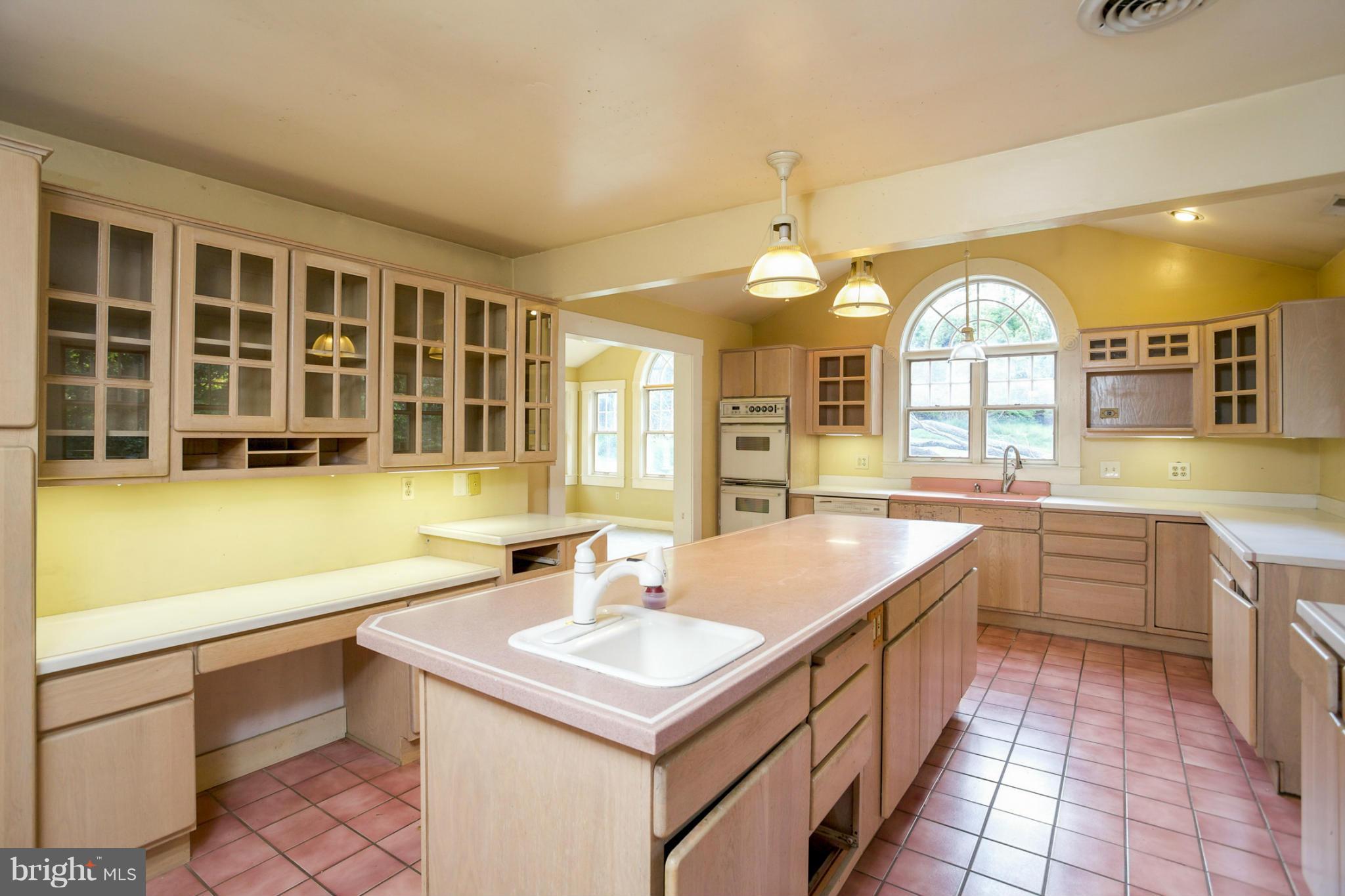 1730 Carrs Mill Road Fallston, MD 21047 - Photo 15 of 29 a kitchen with a sink stove and cabinets