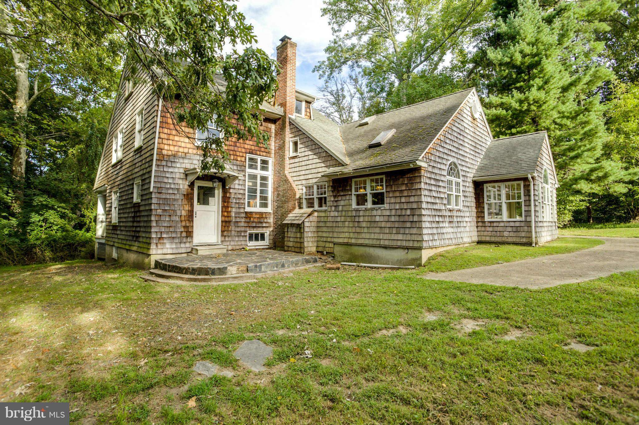 1730 Carrs Mill Road Fallston, MD 21047 - Photo 3 of 29 a front view of a house with a garden