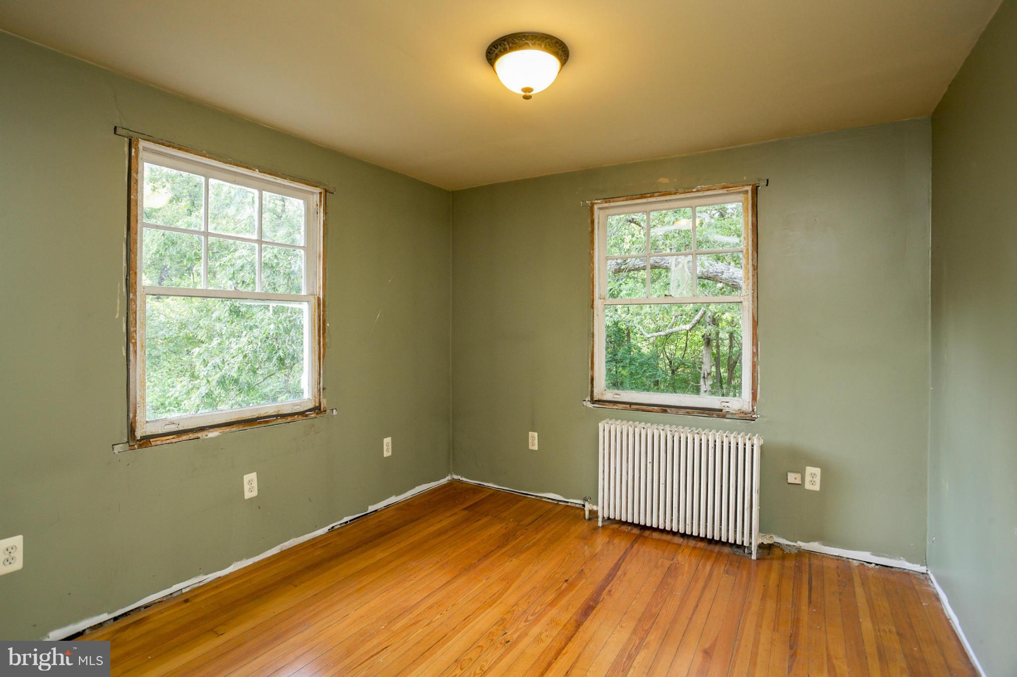 1730 Carrs Mill Road Fallston, MD 21047 - Photo 21 of 29 a view of an empty room with wooden floor and a window