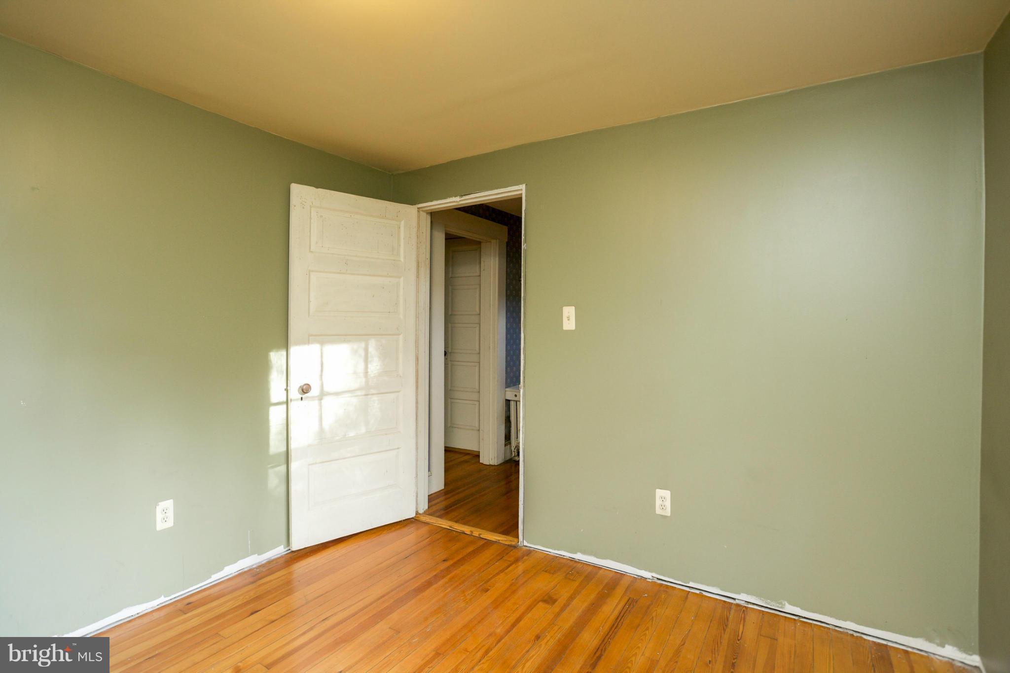 1730 Carrs Mill Road Fallston, MD 21047 - Photo 22 of 29 a view of empty room with wooden floor and fan