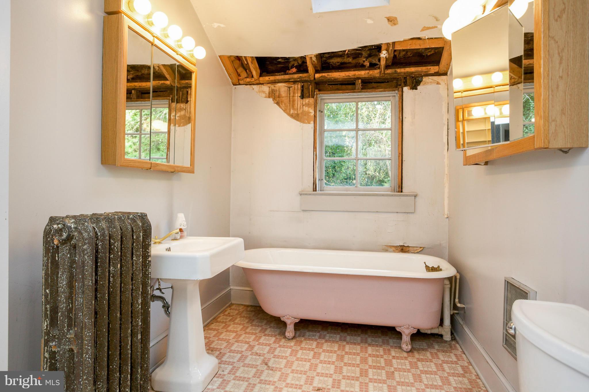 1730 Carrs Mill Road Fallston, MD 21047 - Photo 25 of 29 a bathroom with a sink bathtub and a toilet