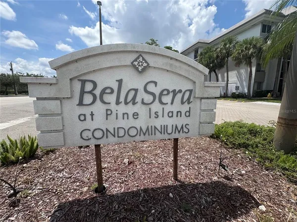 a view of a sign board and building