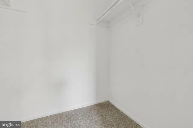 a small space with a white wall