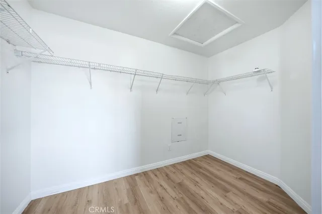 a view of a room that has a window in it