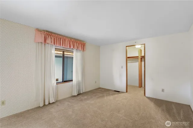 an empty room with windows