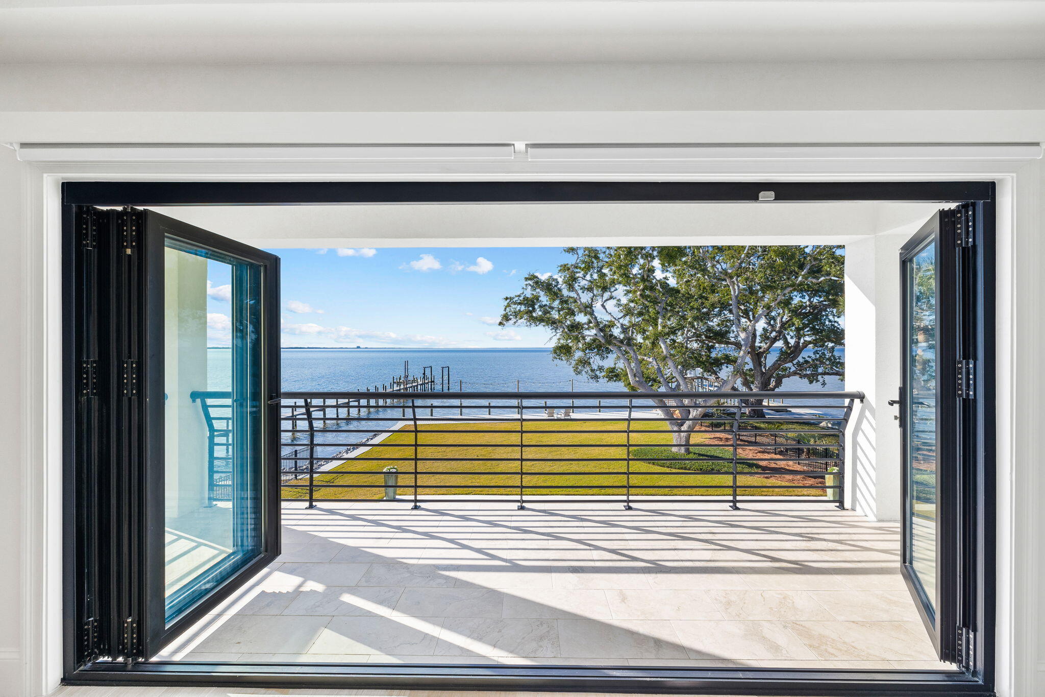 253 Driftwood Point Road Santa Rosa Beach, FL 32459 - Photo 103 of 109 a view of a living room and floor to ceiling window