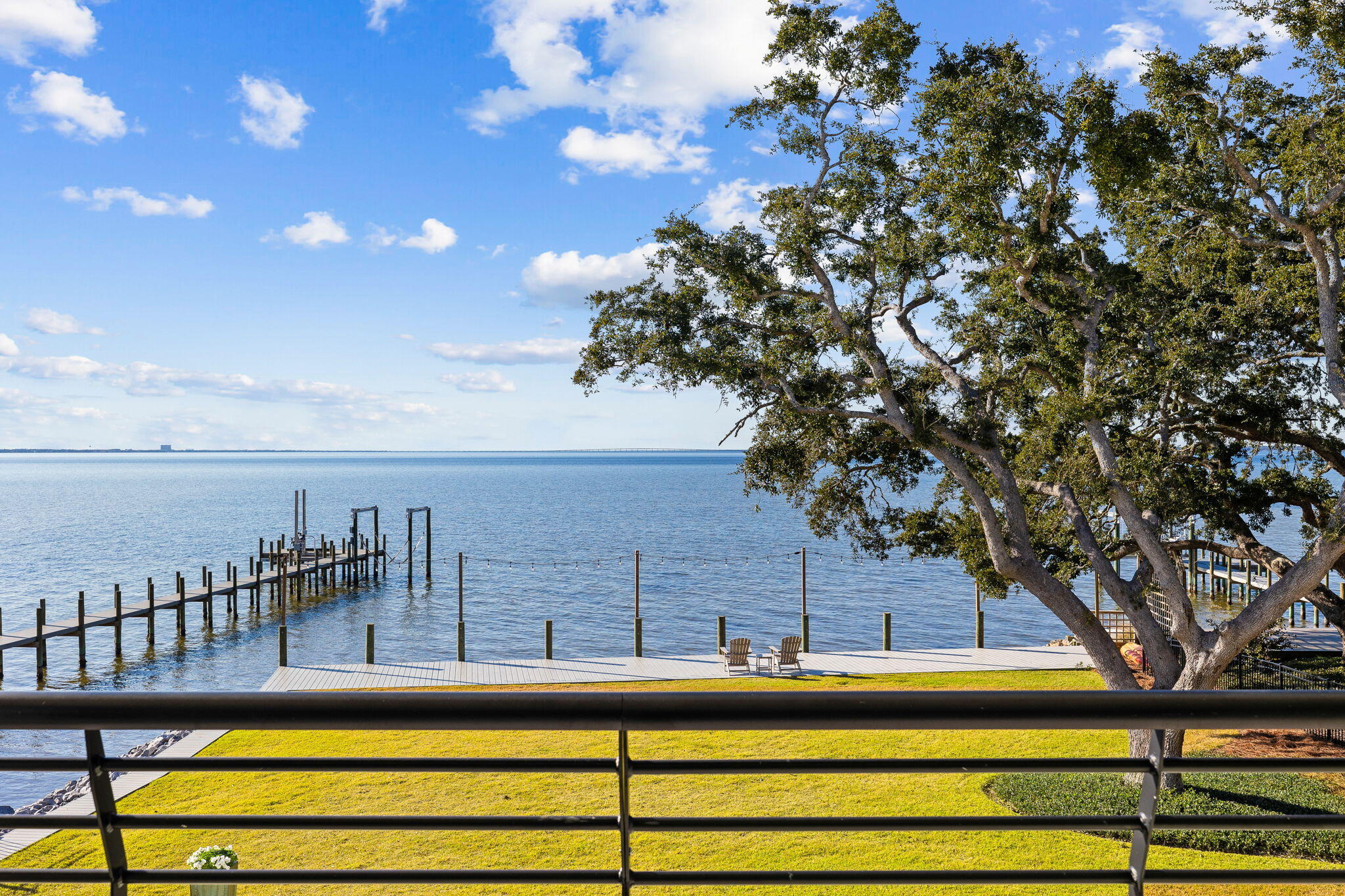 253 Driftwood Point Road Santa Rosa Beach, FL 32459 - Photo 106 of 109 a view of swimming pool with outdoor seating and lake view
