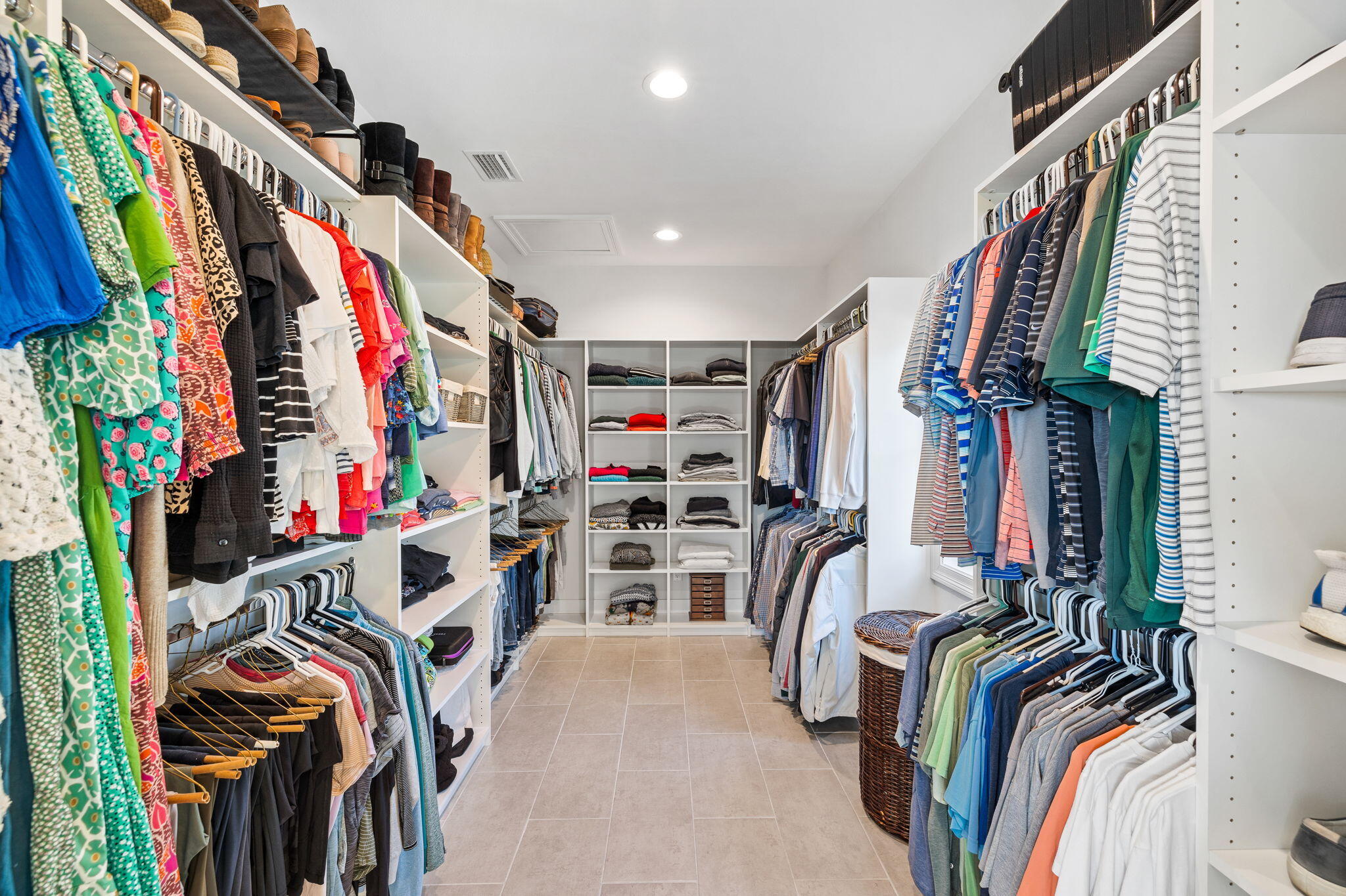 253 Driftwood Point Road Santa Rosa Beach, FL 32459 - Photo 108 of 109 a view of walk in closet with clothes and shoes