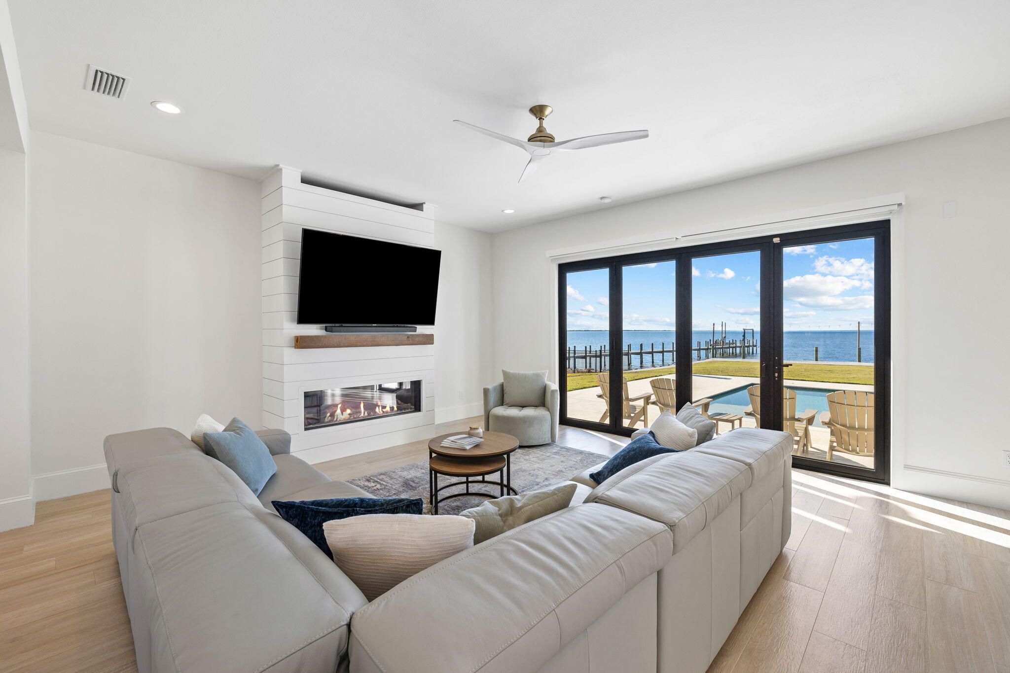 253 Driftwood Point Road Santa Rosa Beach, FL 32459 - Photo 14 of 109 a living room with furniture and a flat screen tv