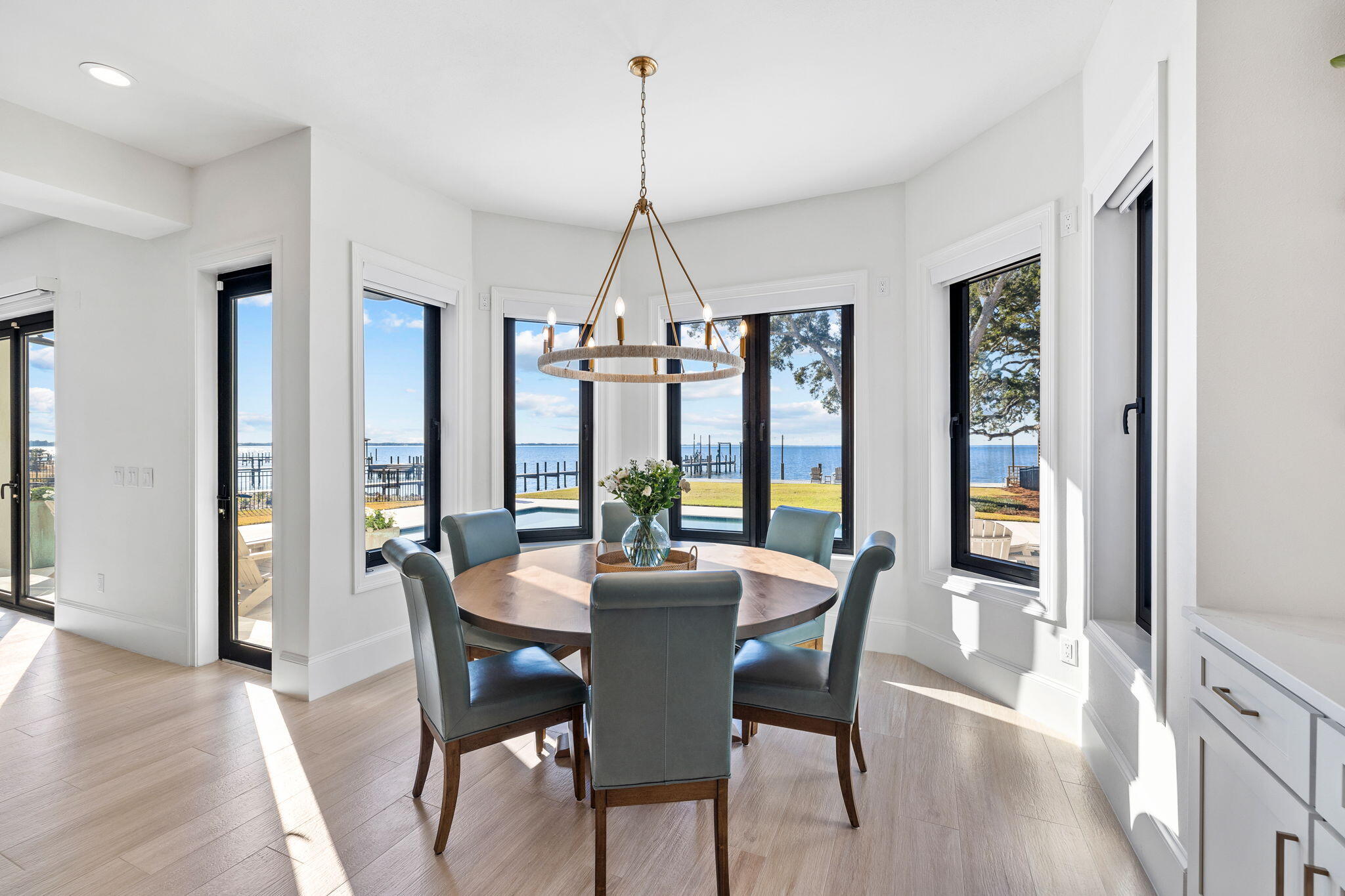 253 Driftwood Point Road Santa Rosa Beach, FL 32459 - Photo 26 of 109 a dining room with furniture window wooden floor