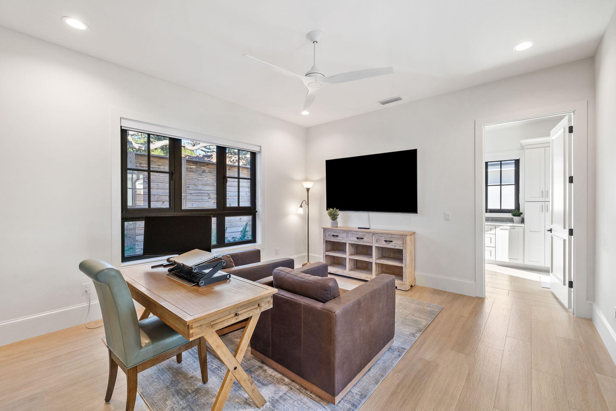 253 Driftwood Point Road Santa Rosa Beach, FL 32459 - Photo 31 of 109 a living room with furniture and a flat screen tv
