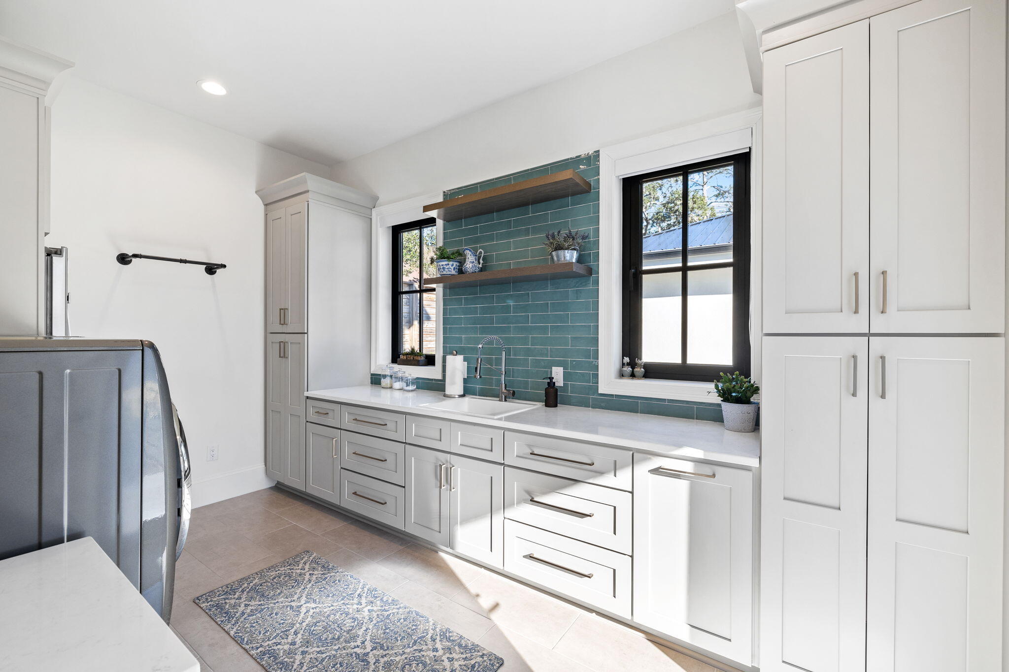 253 Driftwood Point Road Santa Rosa Beach, FL 32459 - Photo 33 of 109 a spacious bathroom with a granite countertop sink and a mirror