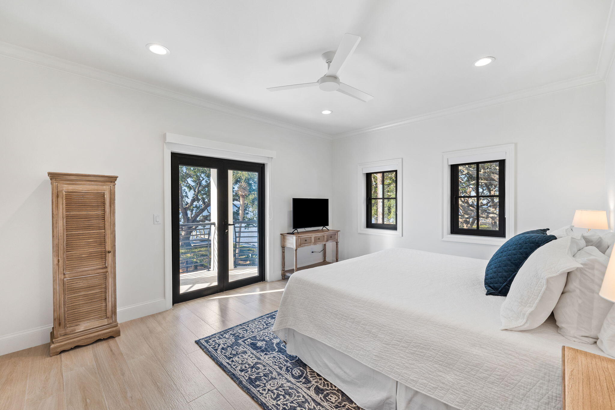 253 Driftwood Point Road Santa Rosa Beach, FL 32459 - Photo 42 of 109 a bedroom with a large bed and a window