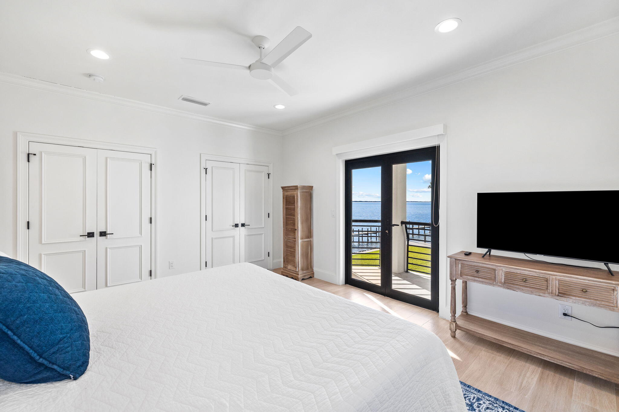 253 Driftwood Point Road Santa Rosa Beach, FL 32459 - Photo 43 of 109 a bedroom with a bed and a flat screen tv