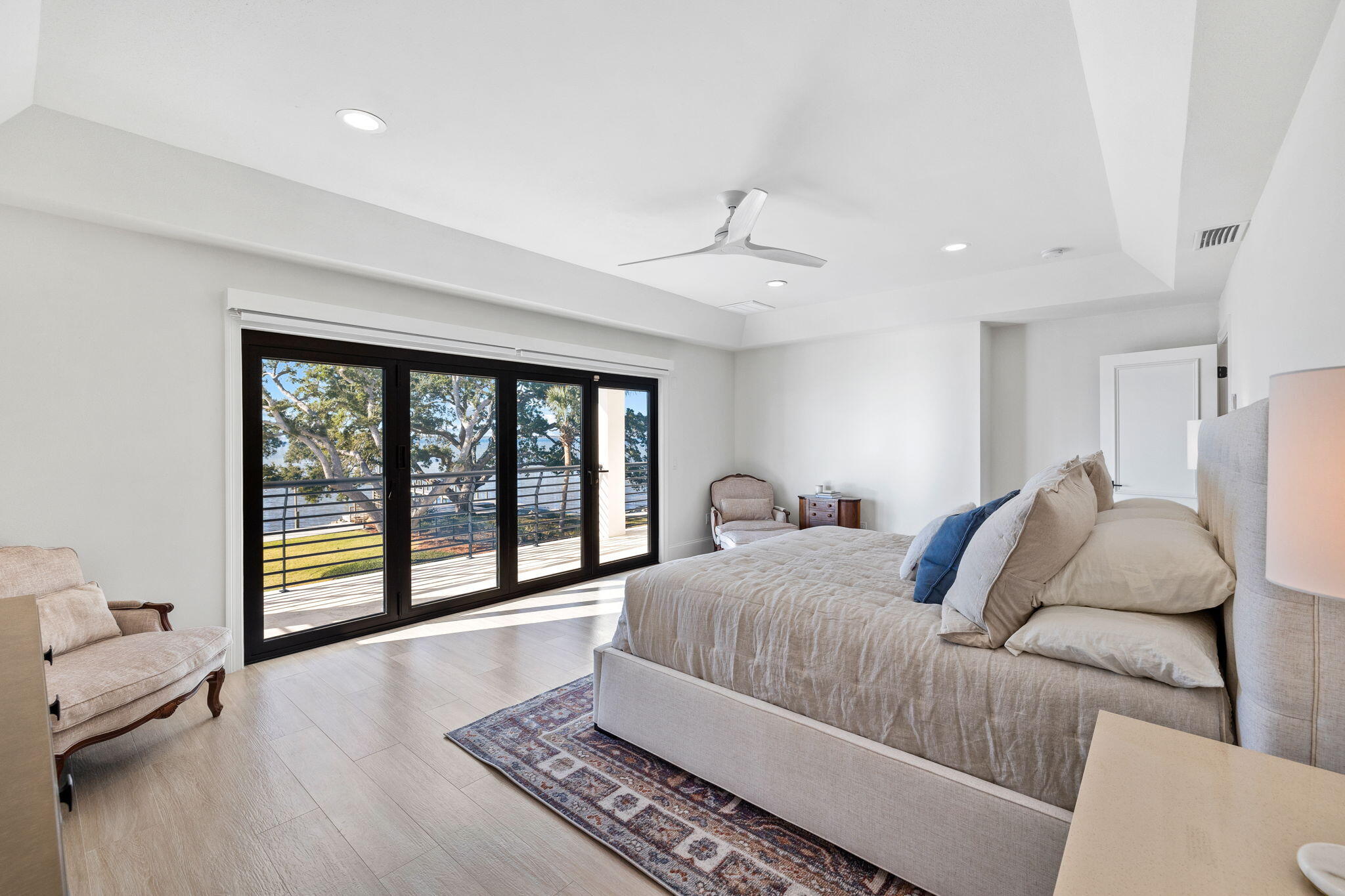 253 Driftwood Point Road Santa Rosa Beach, FL 32459 - Photo 45 of 109 a bedroom with a large bed and a large window