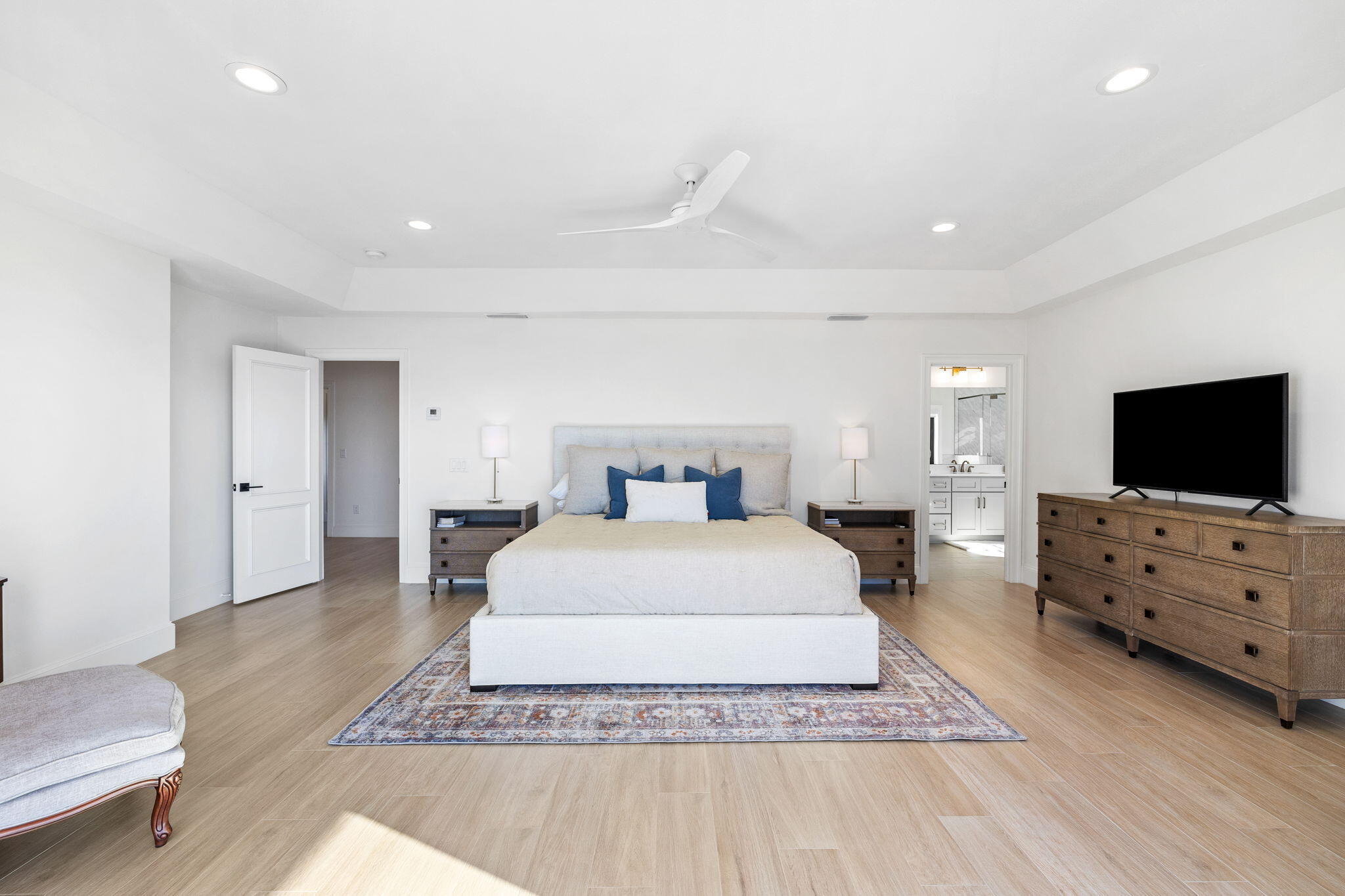 253 Driftwood Point Road Santa Rosa Beach, FL 32459 - Photo 46 of 109 a spacious bedroom with a bed and a flat screen tv