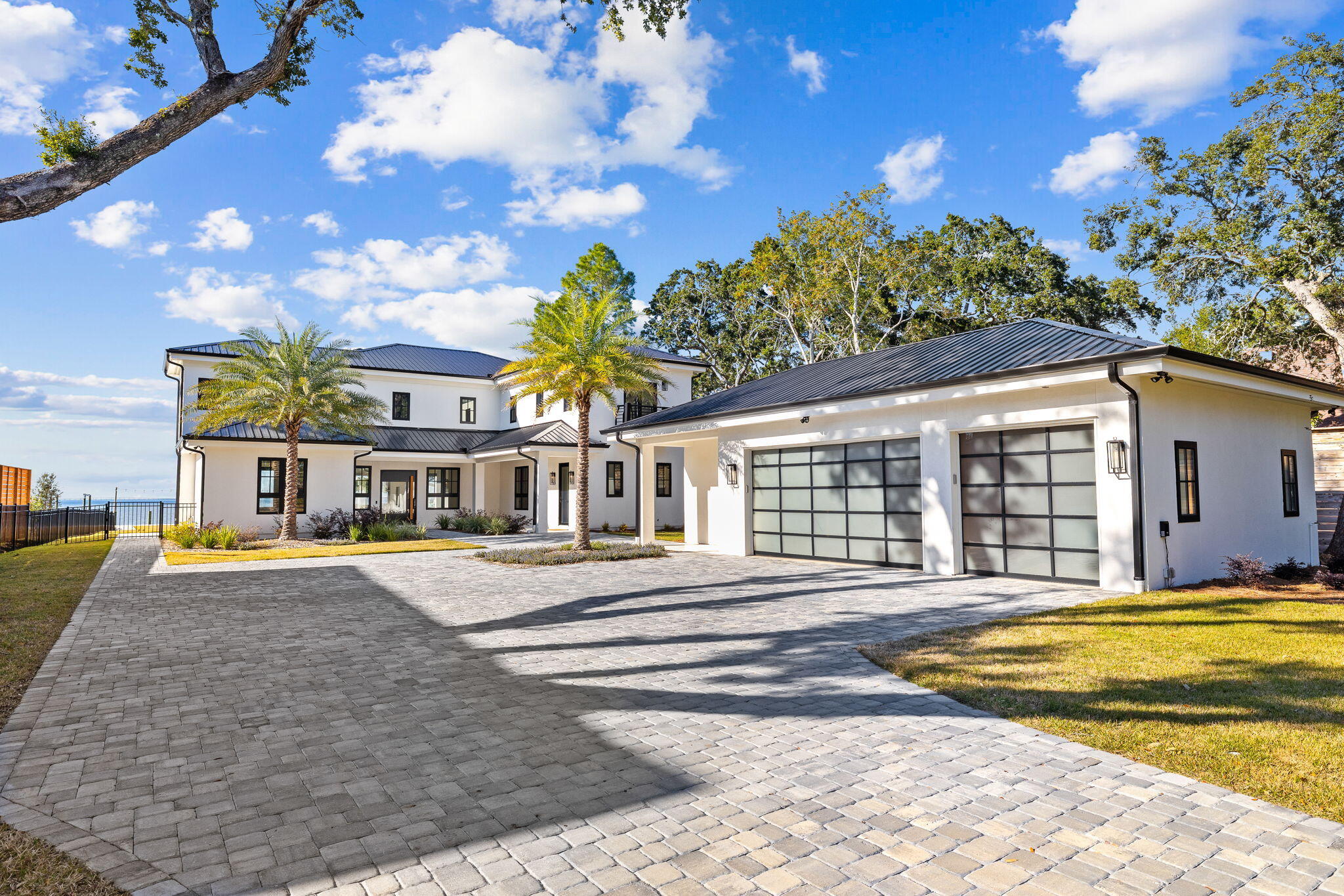 253 Driftwood Point Road Santa Rosa Beach, FL 32459 - Photo 67 of 109 a view of a house with swimming pool and a yard