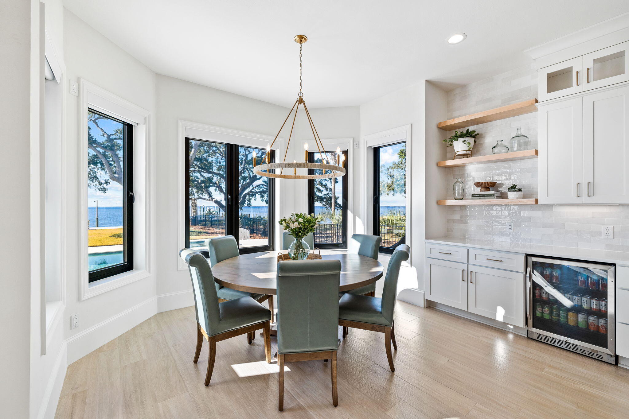 253 Driftwood Point Road Santa Rosa Beach, FL 32459 - Photo 70 of 109 a dining room with furniture window wooden floor
