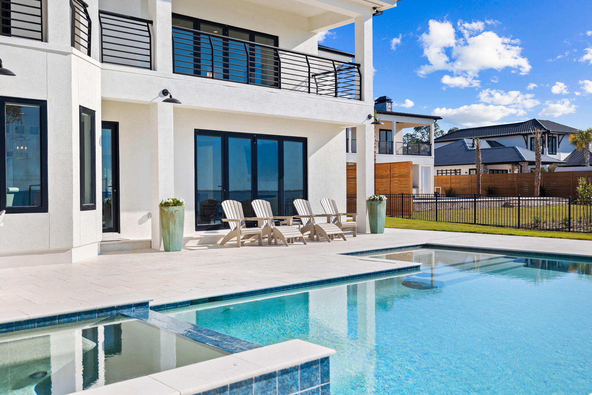 253 Driftwood Point Road Santa Rosa Beach, FL 32459 - Photo 98 of 109 a view of a house with swimming pool and sitting area