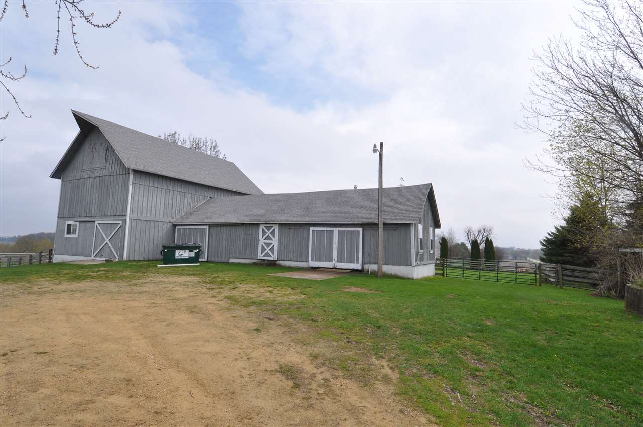 524 Hunter Road Caledonia, IL 61011 - Photo 19 of 32 a view of a terrace with a big yard