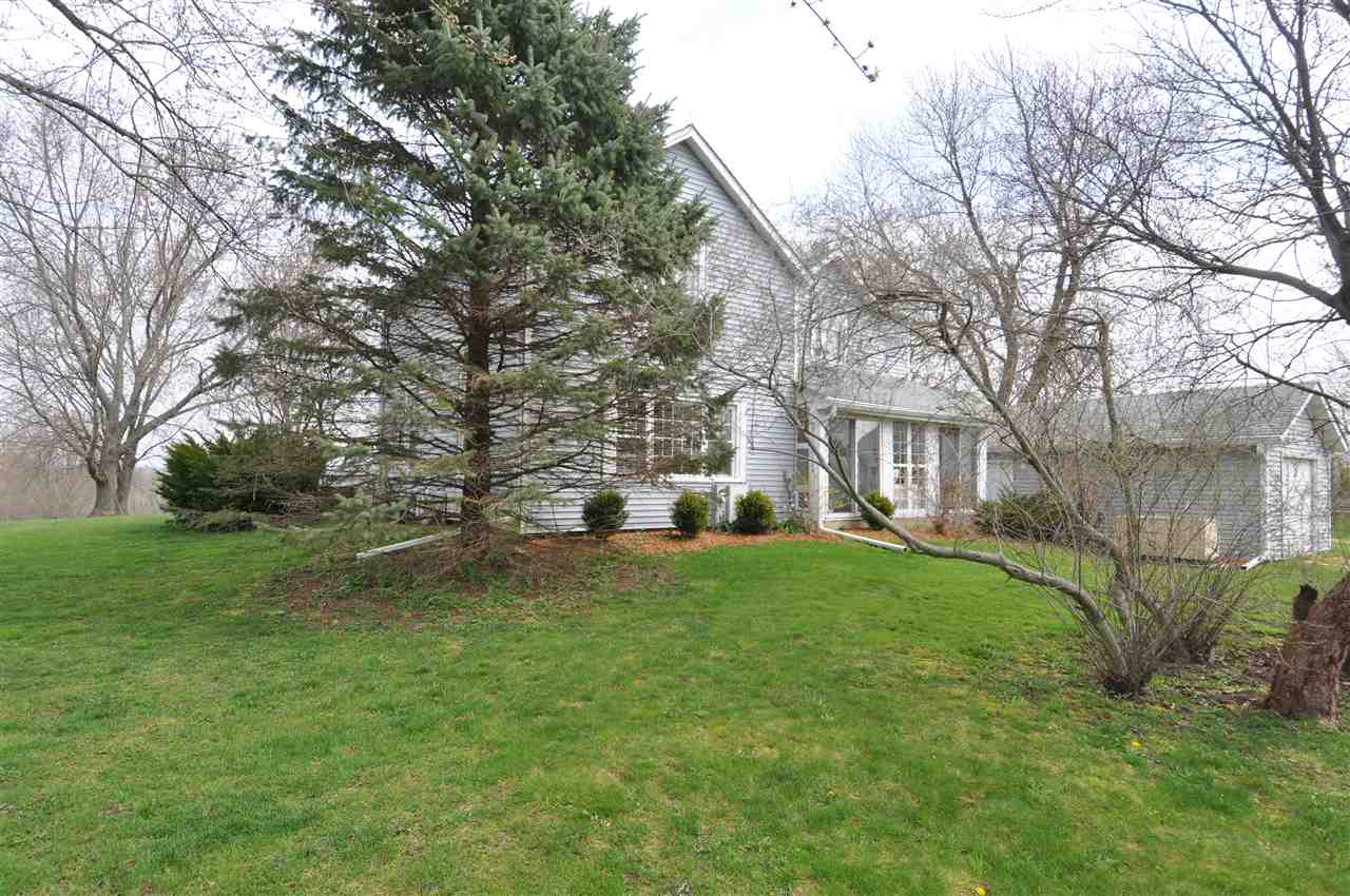 524 Hunter Road Caledonia, IL 61011 - Photo 32 of 32 a view of a house with a big yard