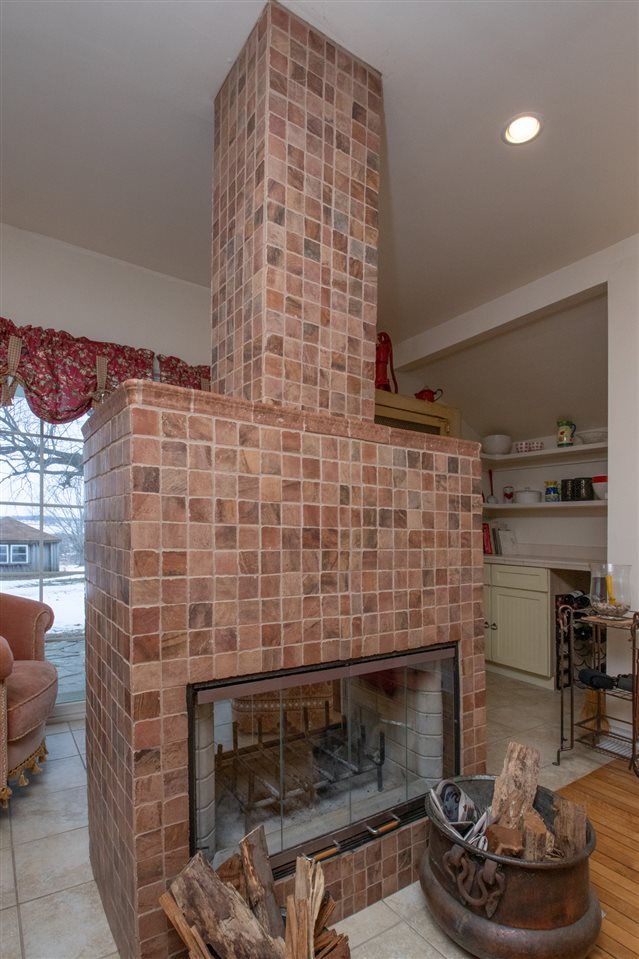 524 Hunter Road Caledonia, IL 61011 - Photo 6 of 32 a room with fireplace and furniture