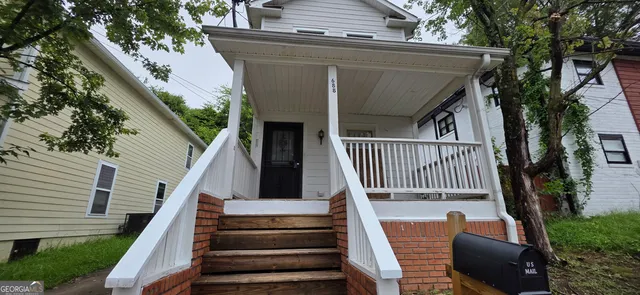 a view of a house with a deck
