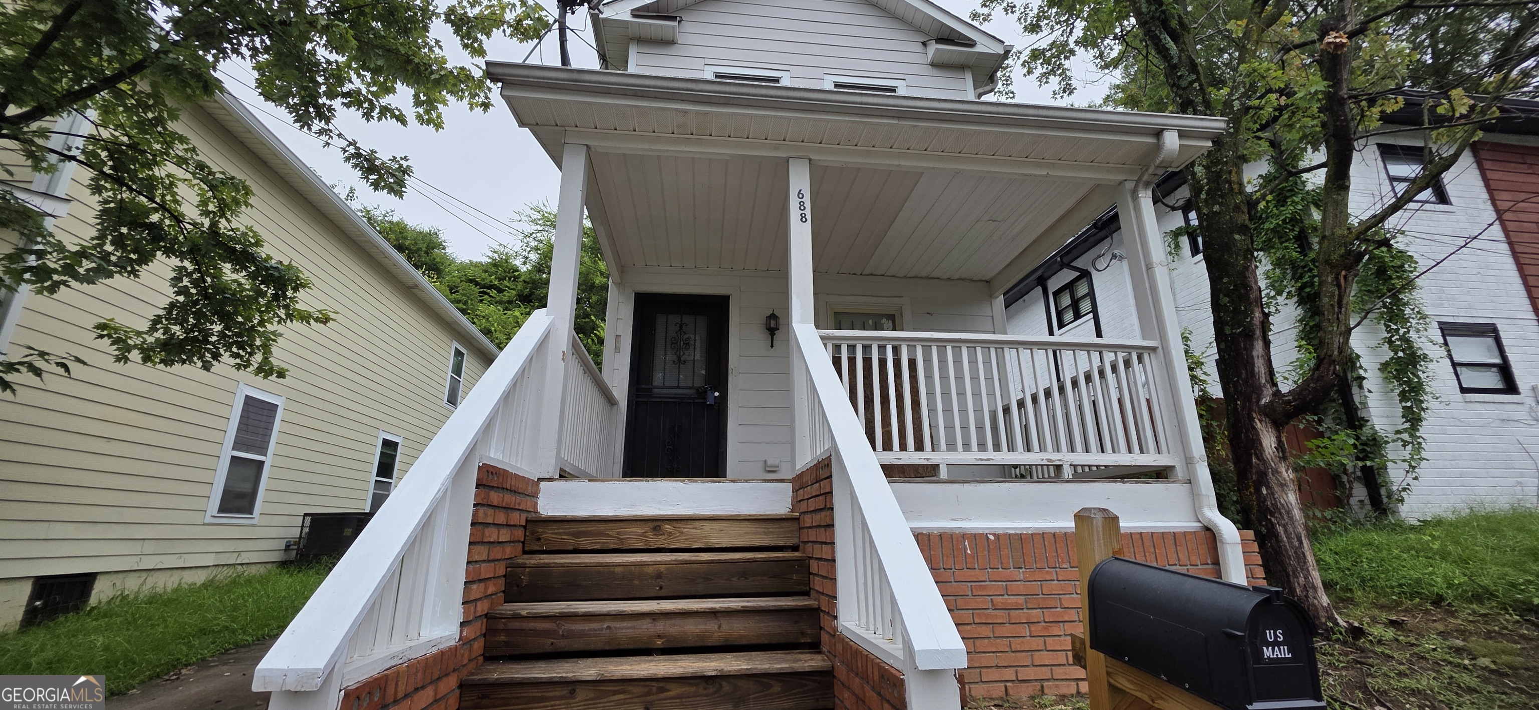 a view of a house with a deck