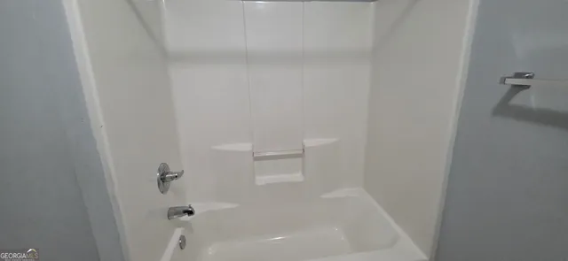 a close up of a bathtub