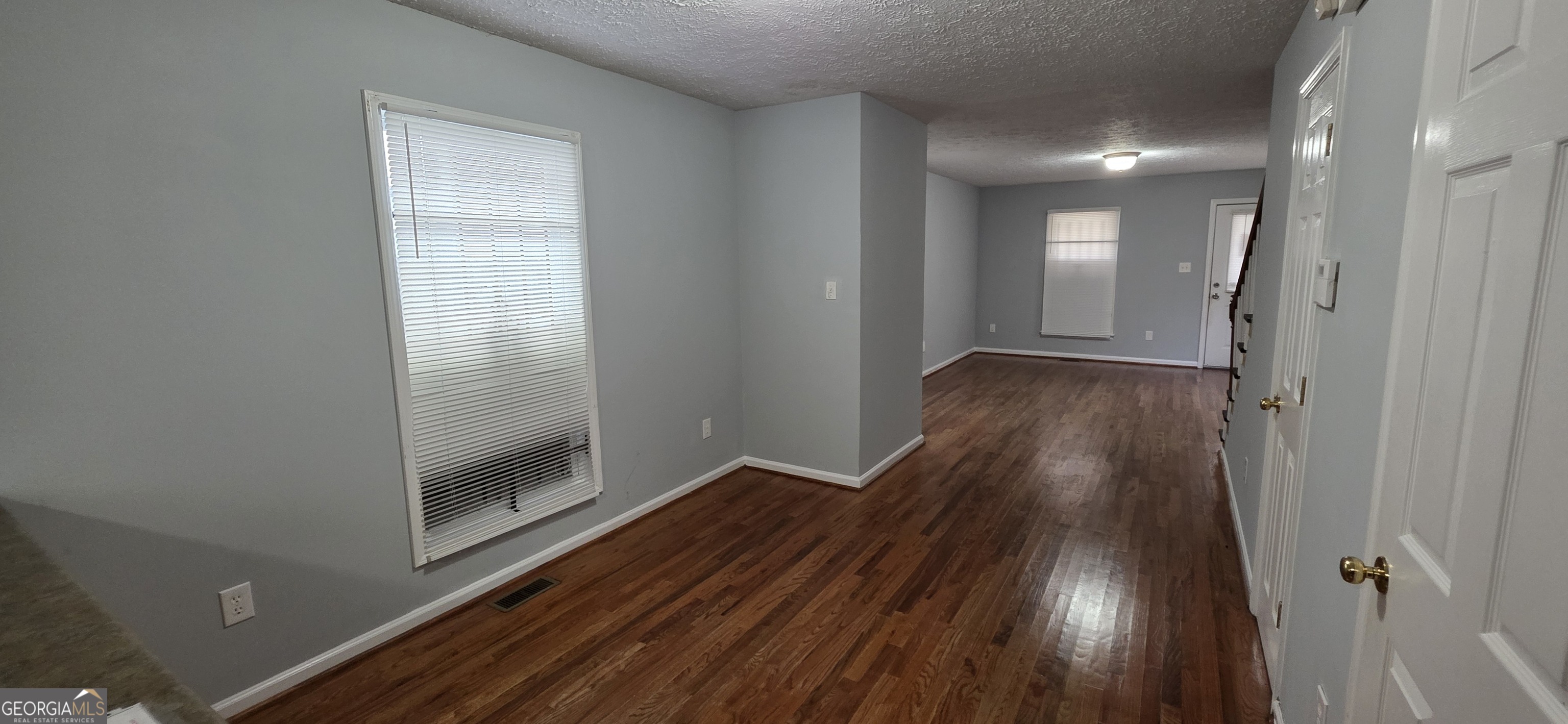688 Smith Street Southwest Atlanta, GA 30310 - Photo 2 of 15 a view of hallway with wooden floor