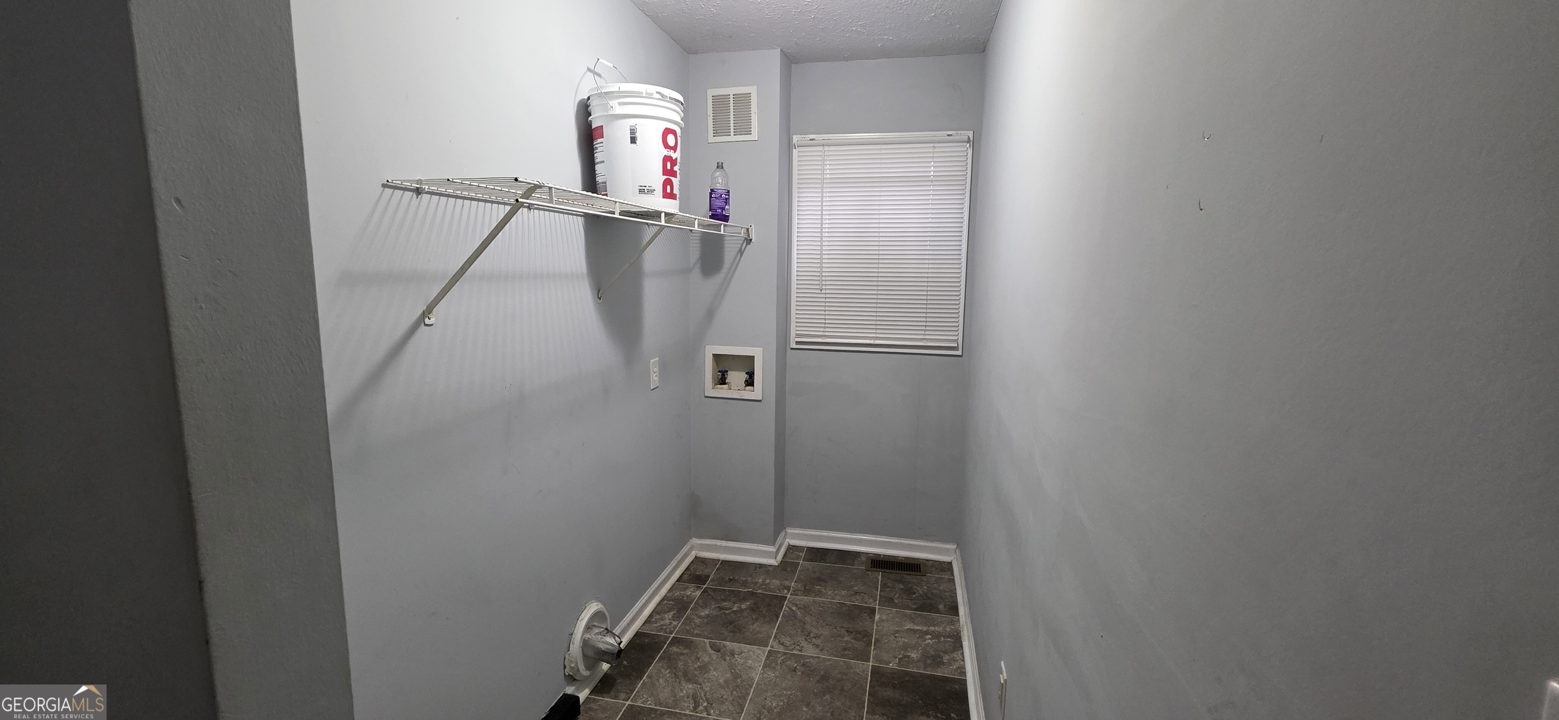 688 Smith Street Southwest Atlanta, GA 30310 - Photo 9 of 15 a bathroom with a shower