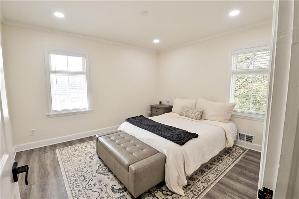 150 Sims Street Winder, GA 30680 - Photo 24 of 61 a bedroom with a bed and a window