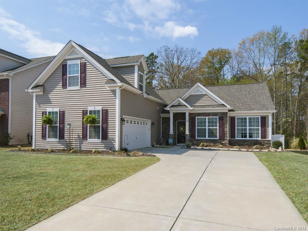 826 Solandra Way Tega Cay, SC 29708 - Photo 1 of 21 a front view of a house with a yard