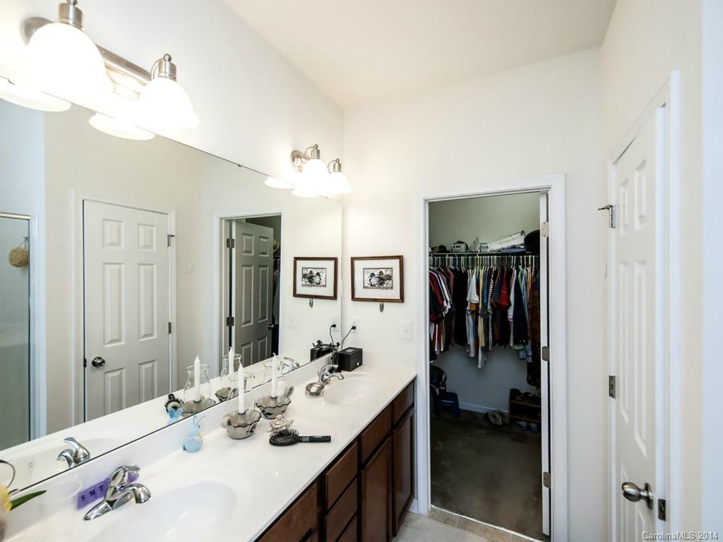 826 Solandra Way Tega Cay, SC 29708 - Photo 11 of 21 a en suite bathroom with a double vanity sink