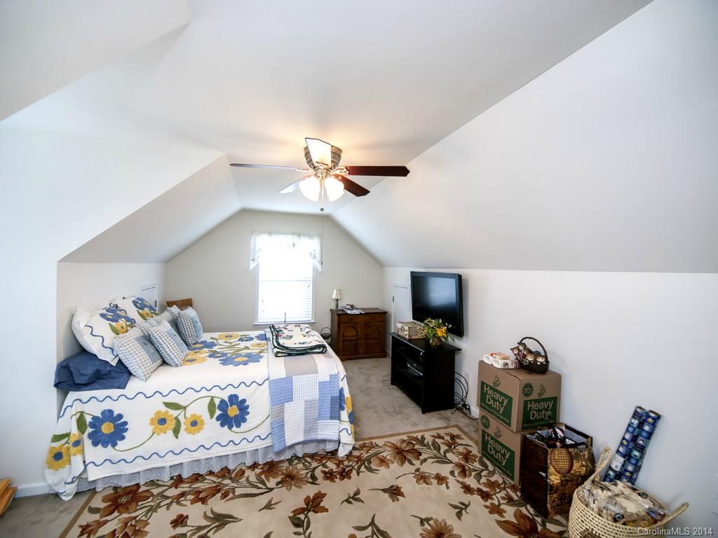 826 Solandra Way Tega Cay, SC 29708 - Photo 17 of 21 a bedroom with furniture and wooden floor