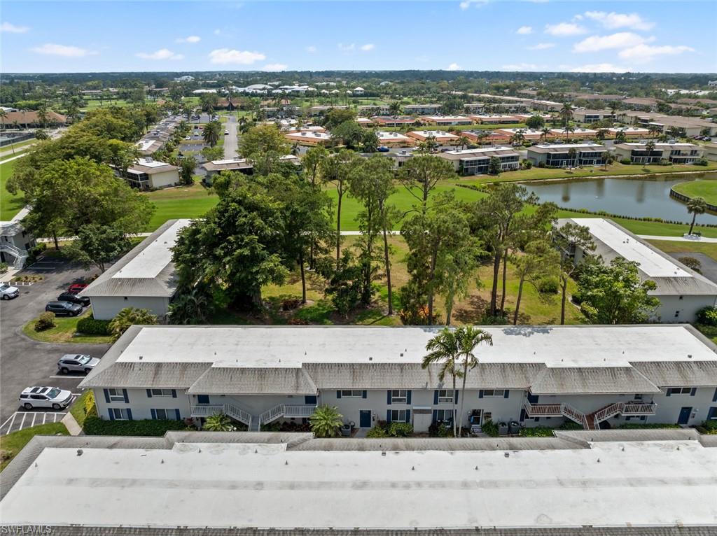 263 Candycane Lane, Unit 5 Naples, FL 34112 - Photo 39 of 49 a view of a city
