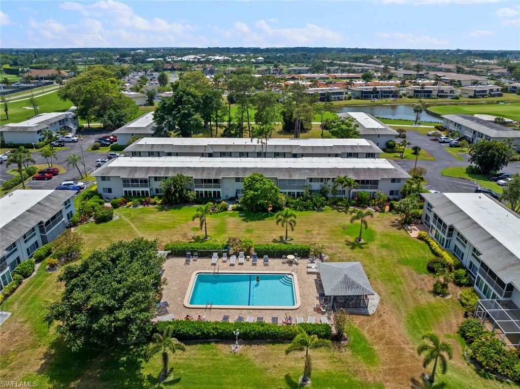 263 Candycane Lane, Unit 5 Naples, FL 34112 - Photo 43 of 49 a view of a city