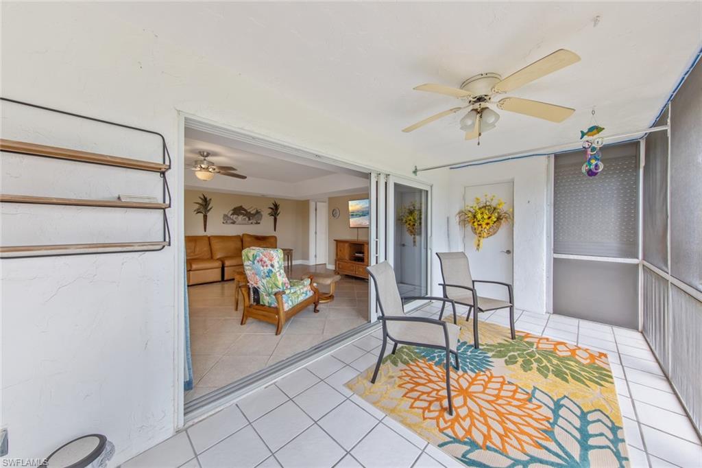 263 Candycane Lane, Unit 5 Naples, FL 34112 - Photo 6 of 49 a living room with furniture