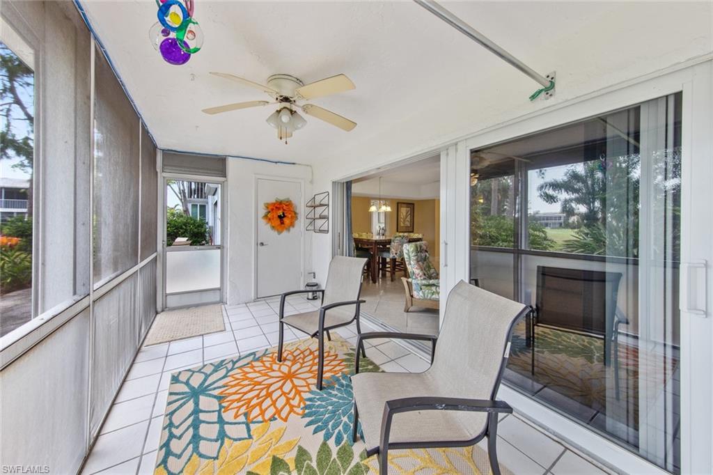 263 Candycane Lane, Unit 5 Naples, FL 34112 - Photo 8 of 49 a living room with furniture