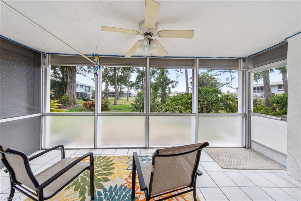 263 Candycane Lane, Unit 5 Naples, FL 34112 - Photo 10 of 49 a view of a dining room with furniture window and outside view