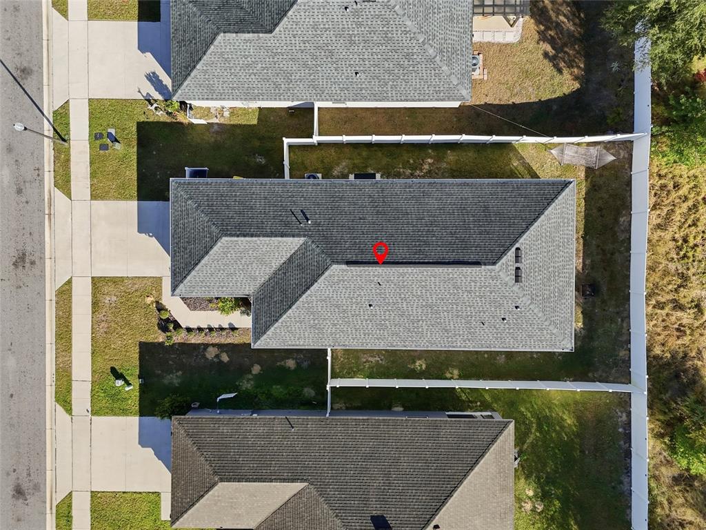 128 Foxtail Loop Davenport, FL 33837 - Photo 31 of 37 an aerial view of a house