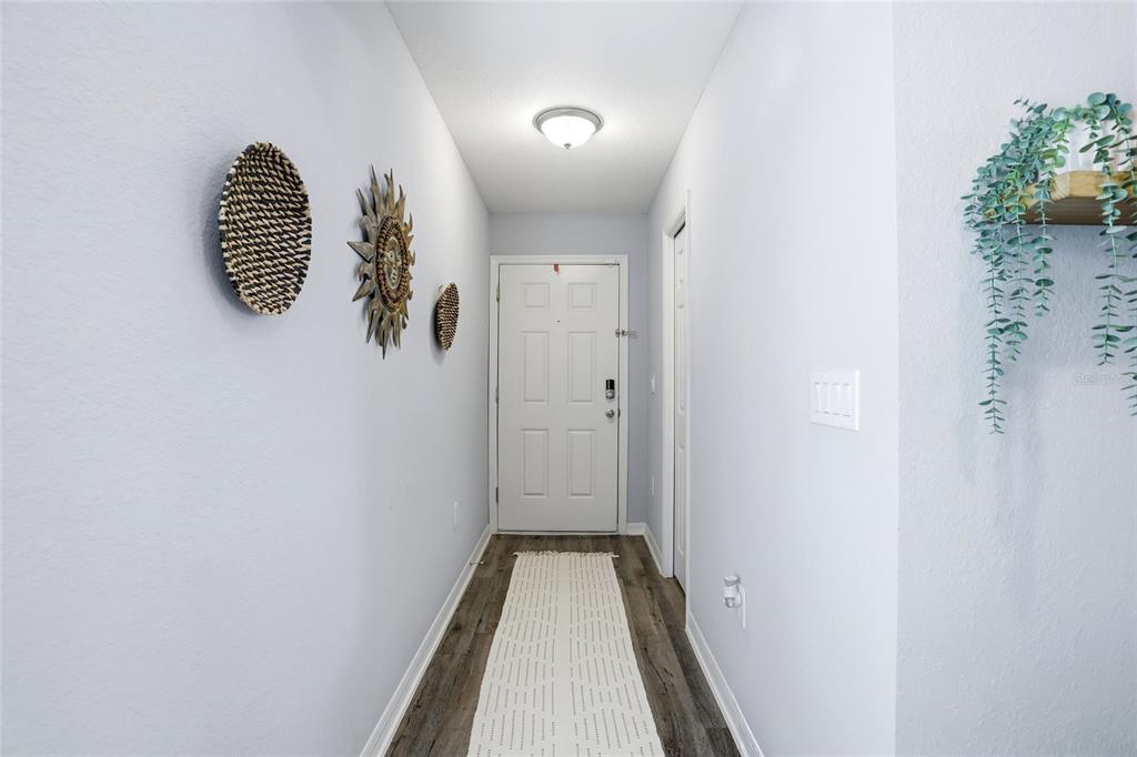 128 Foxtail Loop Davenport, FL 33837 - Photo 4 of 37 a view of a closet area