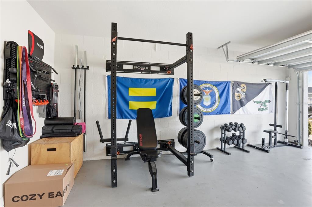 128 Foxtail Loop Davenport, FL 33837 - Photo 6 of 37 a view of a room with gym equipment