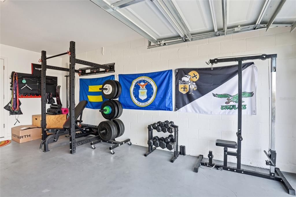 128 Foxtail Loop Davenport, FL 33837 - Photo 7 of 37 a view of a room with gym equipment